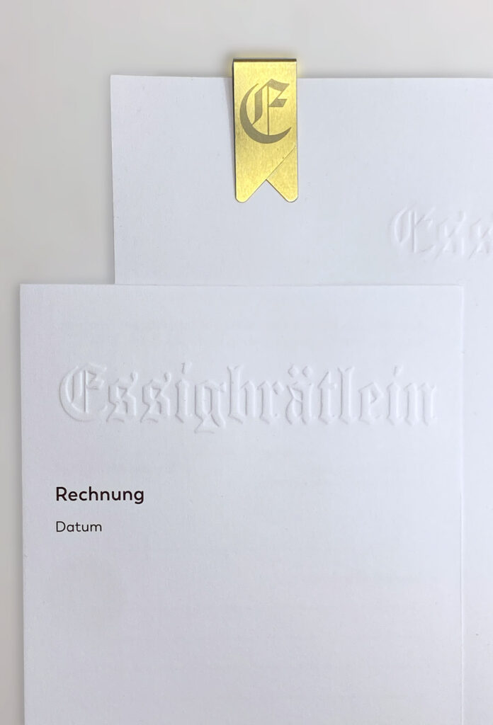 Essigbrätlein Nürnberg Geschäftsausstattung Prägung mit Klammer inGold