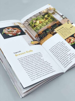 Doppelseite des inGoHo Gostenhof Guides mit einer redaktionell aufbereiteten Anzeige als Beispiel für Leichtigkeit im Design.
